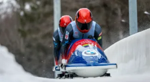 Bobsledding duo pushing a bob